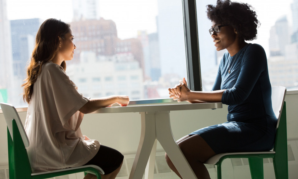 Two ladies across a table